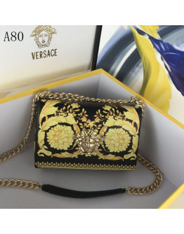 Timeless charm in a Versace bag