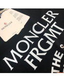 Luxury Moncler shirt and high -end sophistication