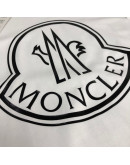 Luxury Moncler shirt and sophistication in each design