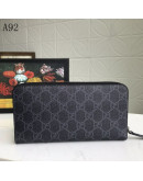 Vanguardist style in a Gucci hand wallet