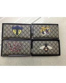 Long wallets with varied prints Gucci