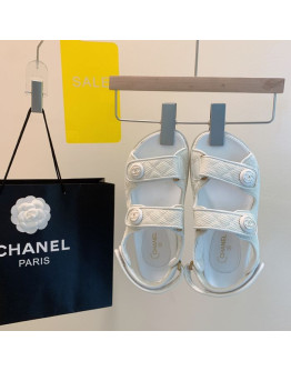 Unicolor synthetic leather sandals with Chanel reason