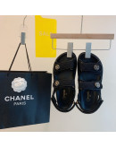 Unicolor synthetic leather sandals with Chanel reason