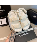 Unicolor synthetic leather sandals with Chanel reason