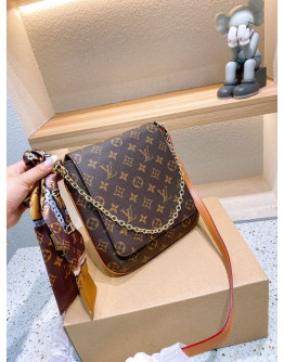 Synthetic leather shoulder bag with Louis Vuitton chain