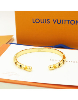 Louis Vuitton's striking golden bracelet