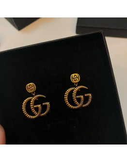 Classic earrings bathed in Gucci