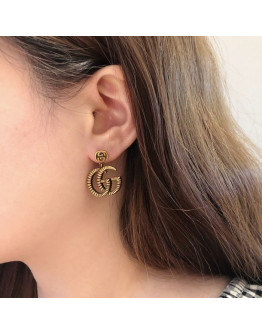 Classic earrings bathed in Gucci