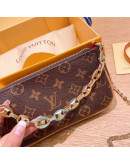 Shoulder bag with Louis Vuitton chain