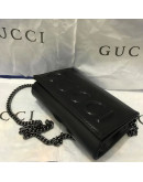 Shoulder bag with motif and Gucci chains