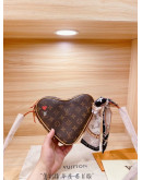 Shoulder bag with heart design Louis Vuitton