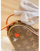 Shoulder bag with heart design Louis Vuitton