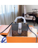 Square shoulder bag with Louis Vuitton handles