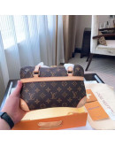 Shoulder bag with handle design by Louis Vuitton