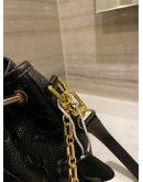 Synthetic leather shoulder padded with Louis Vuitton chain