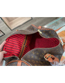 Traveler handbag on the occasion of great capacity Louis Vuitton