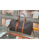 Traveler handbag on the occasion of great capacity Louis Vuitton