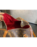 Hand bag Louis Vuitton Synthetic Leather